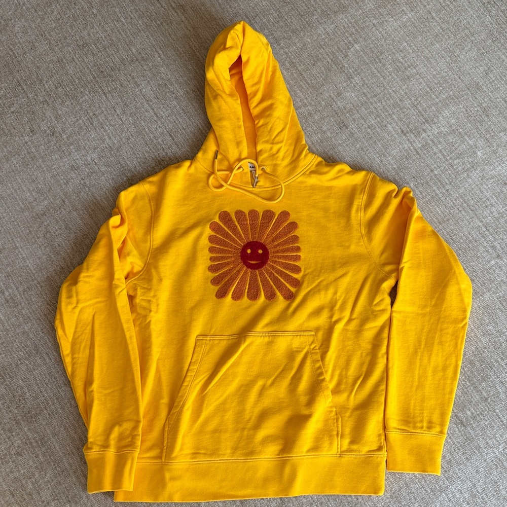 Sandro Yellow Hoodie with Red Smiley Design